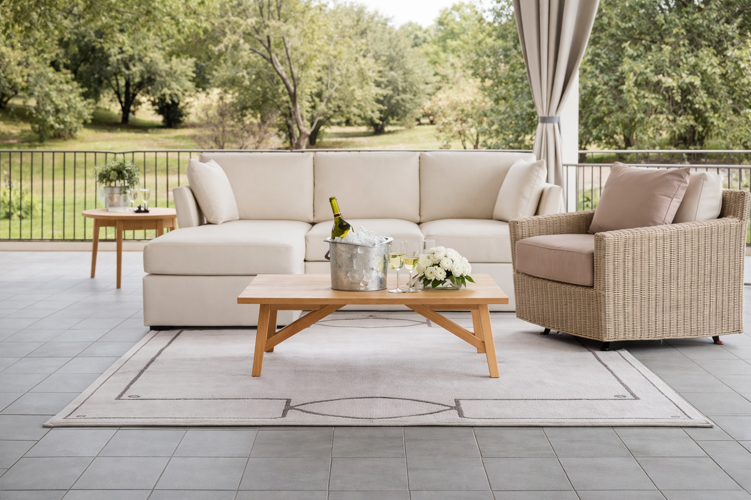 Luxury outdoor lounge set featuring a white sectional sofa.